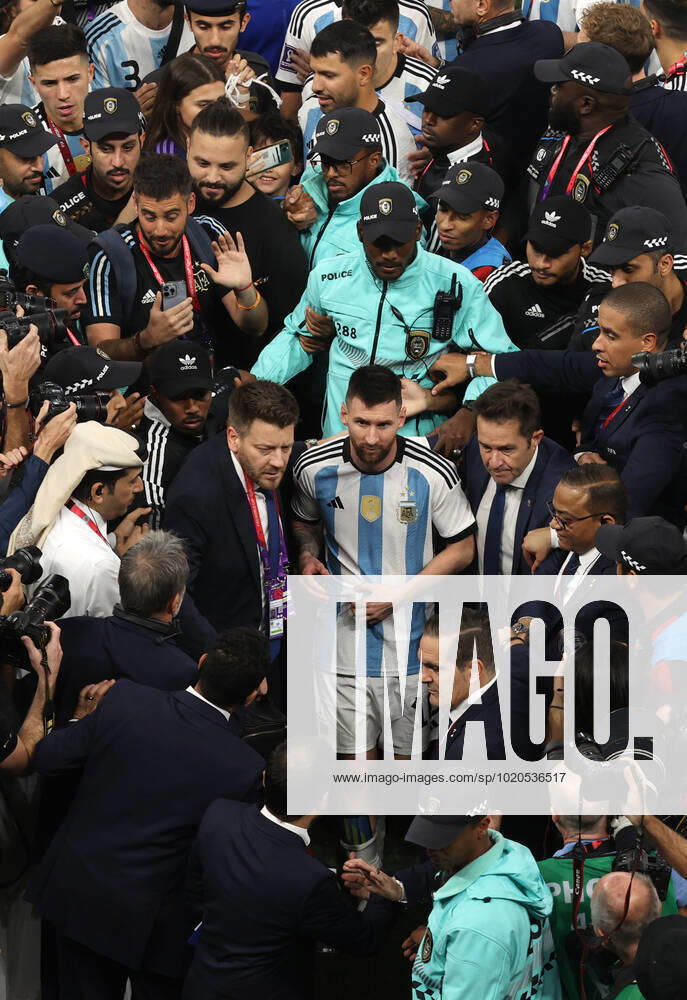 The Final : FIFA World Cup, WM, Weltmeisterschaft, Fussball 18 December 2022, Lusail City - FIFA World Cup Final Qatar 2022 - Argentina v France - Lionel Messi of Argentina makes his way to the dressing room with the help of security - Photo: Charlotte Wilson Offside. Doha Qatar