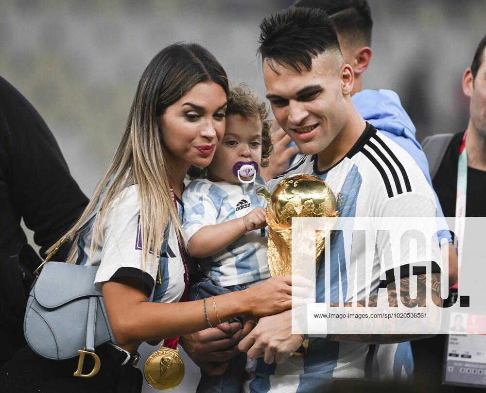 (221218) -- LUSAIER, Dec. 18, 2022 -- Lautaro Martinez (R) of Argentina celebrates with his family during the awarding ceremony of the 2022 FIFA World Cup, WM, Weltmeisterschaft, Fussball at Lusail Stadium in Lusail, Qatar, Dec. 18, 2022. ) (SP)QATAR-LUSAIL-2022 WORLD CUP-FINAL-ARG VS FRA LixGa