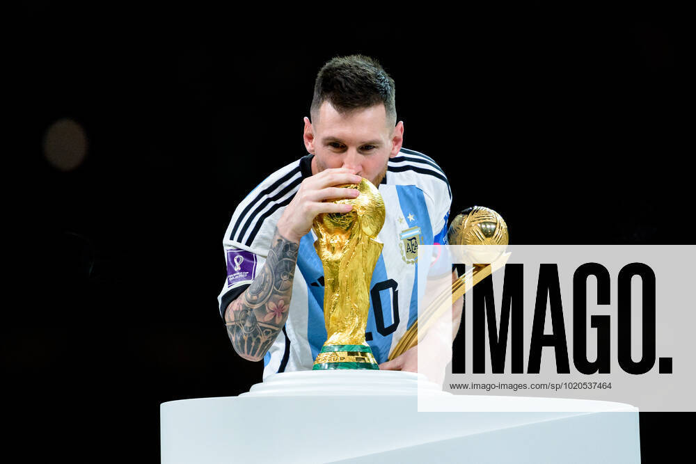 Lionel Messi of Argentina kisses the FIFA World Cup, WM, Weltmeisterschaft, Fussball Trophy after winning the FIFA World Cup 2022 final between Argentina and France on December 18, 2022 in Doha. Photo: Joel Marklund BILDBYRAN kod JM JM0415 bbeng fotboll football soccer fotball vm fotbolls-vm fotball-vm fotbolls-vm 2022 fifa world cup 2022 final argentina frankrike france champions world champions FIFA World Cup Champions Gold medalist jubel celebration