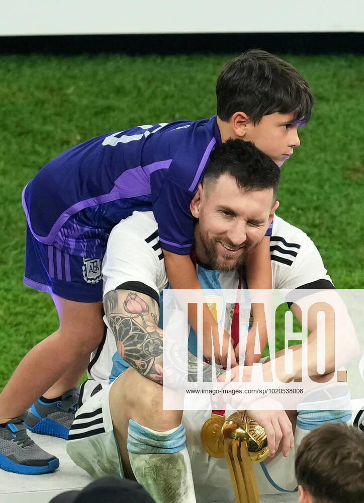(221218) -- LUSAIL, Dec. 18, 2022 -- Lionel Messi of Argentina celebrates with his family after the awarding ceremony of the 2022 FIFA World Cup, WM, Weltmeisterschaft, Fussball at Lusail Stadium in Lusail, Qatar, Dec. 18, 2022. ) (SP)QATAR-LUSAIL-2022 WORLD CUP-FINAL-ARG VS FRA PanxYulong