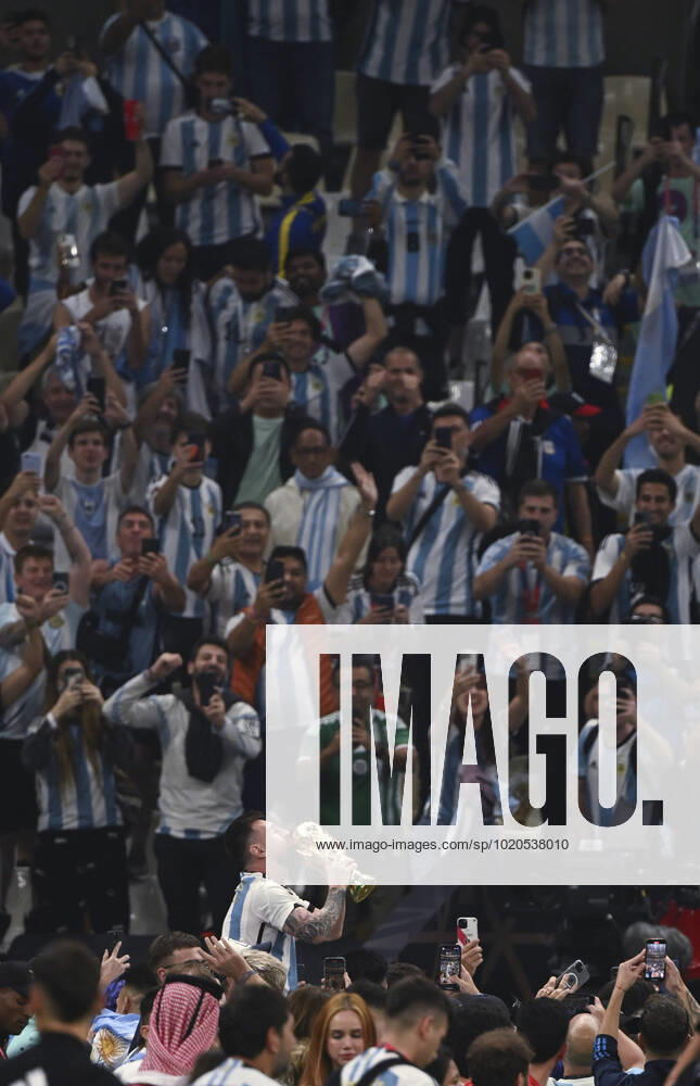 (221218) -- LUSAIER, Dec. 18, 2022 -- Lionel Messi of Argentina celebrates with the trophy in front of the fans after winning the Final between Argentina and France at the 2022 FIFA World Cup, WM, Weltmeisterschaft, Fussball at Lusail Stadium in Lusail, Qatar, Dec. 18, 2022. ) (SP)QATAR-LUSAIL-2022 WORLD CUP-FINAL-ARG VS FRA LixGa