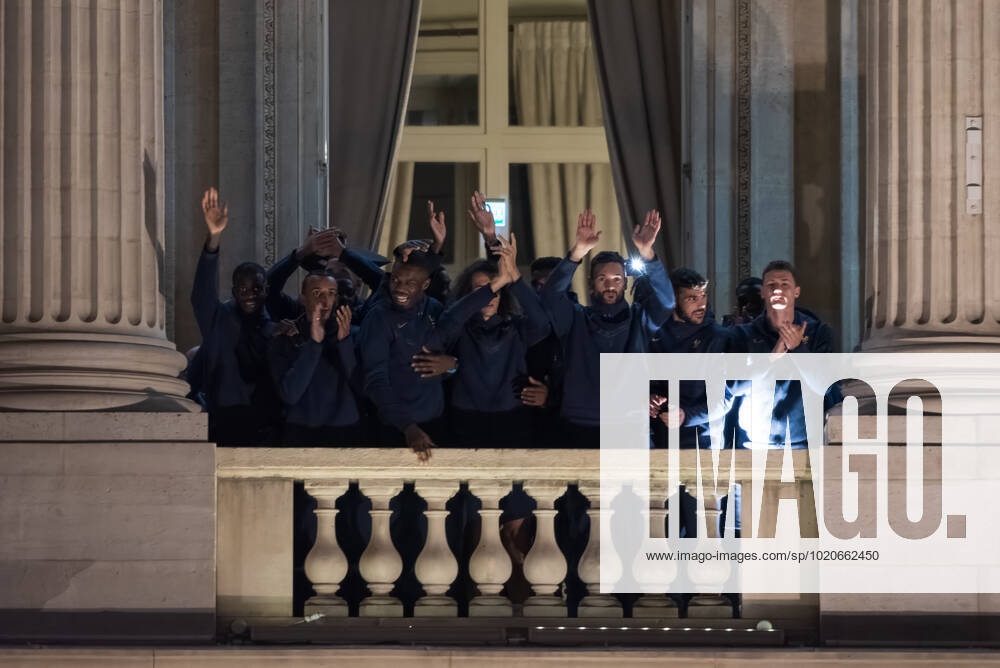 French Football Team Fans Greet The Players On The Place De La Concorde In Paris French football team players Hugo LLoris, Matte Guendouzi, Benjamin Pavard, Lucas Hernandez, Jules Kounde et Randall Kolo Muani wave to the crowd as French football team supporters gather on the Place de la Concorde with French flags to welcome the players on the balcony of the Hotel de Crillon after their return from Qatar following their defeat against Argentina in the World Cup final in Paris on December 19, 2022. Paris France