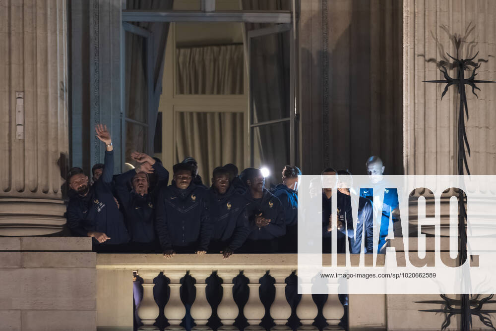 French Football Team Fans Greet The Players On The Place De La Concorde In Paris French football team players including Kylian Mbappe, Aurelien Tchouameni, Antoine Griezman, Adrien Rabiot and Olivier Giroud wave to the crowd as French football team supporters gather on the Place de la Concorde with French flags to welcome the players on the balcony of the Hotel de Crillon after their return from Qatar following their defeat by Argentina in the World Cup final in Paris on December 19, 2022. Paris France