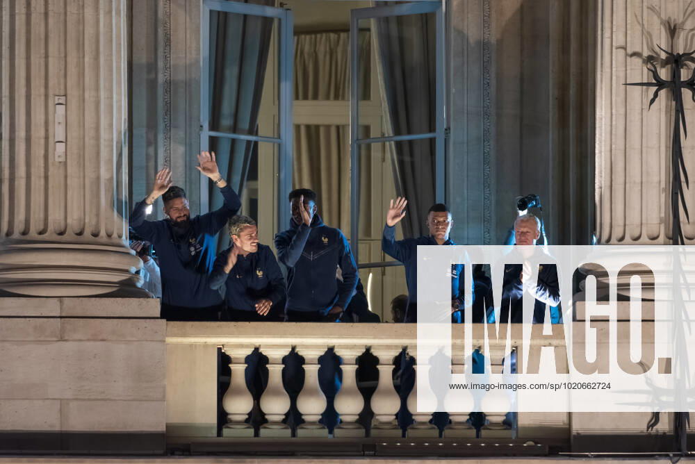 French Football Team Fans Greet The Players On The Place De La Concorde In Paris French football team players including Kylian Mbappe, Aurelien Tchouameni, Antoine Griezman and Olivier Giroud wave to the crowd as French football team supporters gather on the Place de la Concorde with French flags to welcome the players on the balcony of the Hotel de Crillon after their return from Qatar following their defeat by Argentina in the World Cup final in Paris on December 19, 2022. Paris France