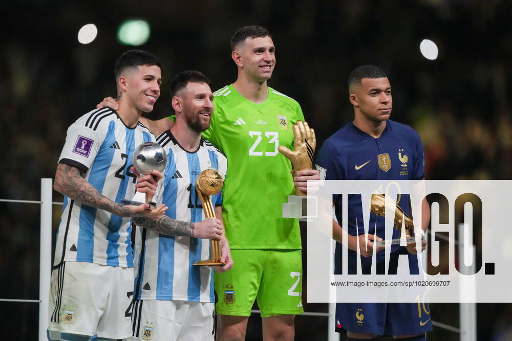 Player of Argentina Enzo Fernandez 24, Lionel Messi 10, Emiliano Martinez 23 and player of France Kylian Mbappà 10 pose for a photo with their awards after the FIFA World Cup, WM, Weltmeisterschaft, Fussball Qatar 2022 Final match between Argentina and France on December 18, 2022, at Lusail Iconic Stadium in Lusail, Qatar. (Photo by Florencia Tan Jun PxImages Icon Sportswire) SOCCER: DEC 18 FIFA World Cup Final - France v Argentina Icon221218108