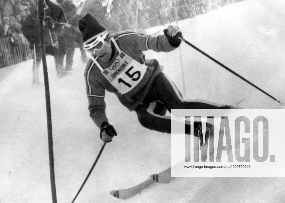 He Wins He Wins He wins after the leader s are disqualified The 10th Winter Olympics took a sensational turn this morning when French ski ace Jean Claude Killy , already the winner of two gold medals became the second skier in history to take the triple crown of Olympic alpine racing by winning the men s slalom after two leaders had been disqualified . Killy 24 , finished 3rd in the slalom , but the two leader s , Norway s Haakon Mjoen and Austria s Karl Schranz were disqualified for missing gates . The only other person to win all three alpine gold medal s was Austria s Toni Sailer in 1956 . 17th February 1968 France