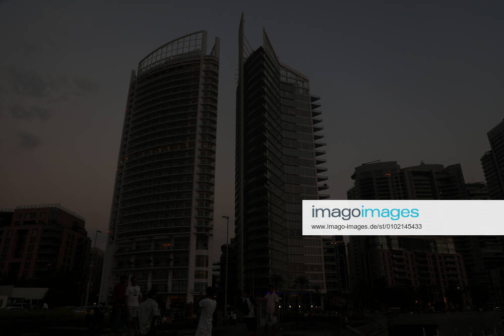 (200705) -- BEIRUT, July 5, 2020 (Xinhua) -- Photo taken on July 5, 2020 shows buildings in darkness during a blackout in Beirut, Lebanon. Hundreds protested on Sunday near Lebanon s state power utility Electricite Du Liban (EDL) against increased power cuts in the country, a local media outlet reported. Lebanon has seen an increase in power cuts from three hours to about 14 hours a day in the past two weeks because of the shortage in fuel used to operate the power plants. (Photo by Bilal Jawich Xinhua) LEBANON-BEIRUT-POWER CUTS