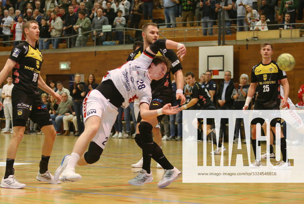 BAU 22.02.2023 Bietigheim Handball SG BBM Bietigheim vs. HSC 2000 Coburg, v.l. Arkadiusz Ossowski (Coburg), Valentin Clarius (BBM), Bartlomiej Bis (Coburg), Jacob Knauer (Coburg)