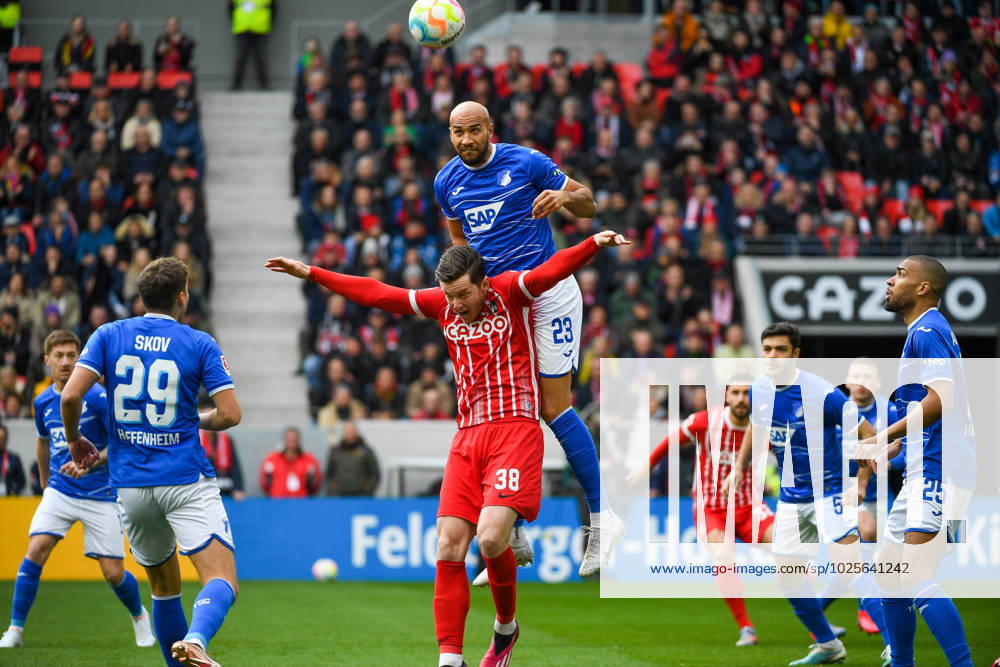 KW10 Fussball 1. Bundesliga 24. Spieltag - 22 23 - SC Freiburg vs. TSG 1899 Hoffenheim - 12-03-2023 John Anthony Brooks (TSG 1899 Hoffenheim 23) beim Kopfballduell mit Michael Gregoritsch (SC Freiburg 38). Fussball 1. Bundesliga: SC Freiburg vs. TSG 1899 Hoffenheim am Sonntag, den 12. Maerz 2023 im Europa-Park Stadion in Freiburg im Breisgau DFL REGULATIONS PROHIBIT ANY USE OF PHOTOGRAPHS AS IMAGE SEQUENCES AND OR QUASI-VIDEO.