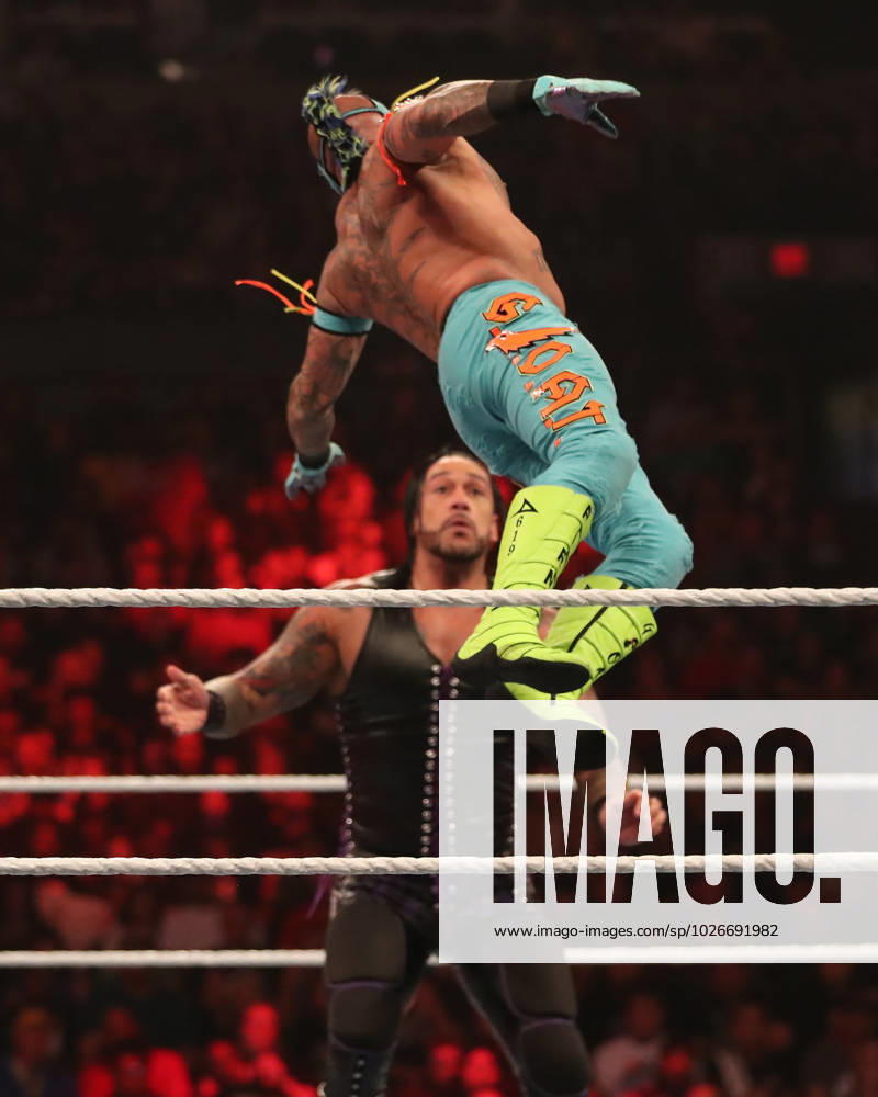 PHOENIX, ARIZONA - MARCH 27: Rey Mysterio jumps to attack Damian Priest during WWE WrestleMania RAW at the Footprint Center on March 27, 2023 in Phoenix, Arizona, United States. Phoenix United States - ZUMAp175 20230327_zsa_p175_073