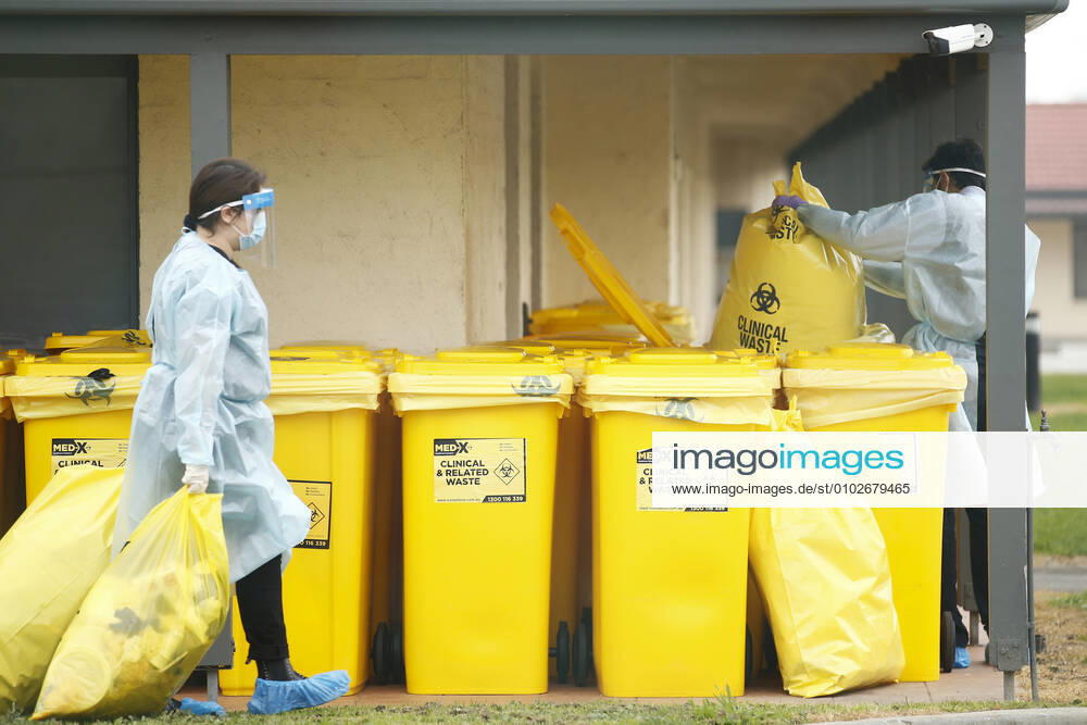 VICTORIA CORONAVIRUS COVID-19, Medical staff dispose of clinical waste at the St Basil?s Home for the Aged Care in Fawkner which has had an outbreak of COVID-19, in Melbourne, Sunday, July 26, 2020. Victoria has recorded 10 new COVID-19 deaths and 459 new cases to Sunday, with the national death toll now at 155. ( NO ARCHIVING, , NO USE IN BOOKS WITHOUT CONSENT MELBOURNE VIC AUSTRALIA