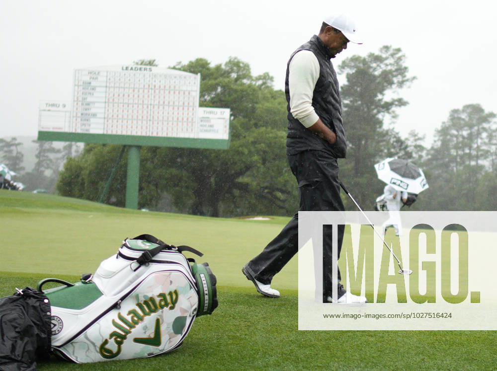 Tiger Woods walks to ball on the 18th hole during the rain-delayed second round at the 87th Masters tournament at Augusta National Golf Club in Augusta, Georgia on Saturday, April 8, 2023. Woods finished at 147, 3 shots over par, but made the cut for the 23rd consecutive time tying Gary Player and Fred Couples. AUG20230408217 BOBxSTRONG