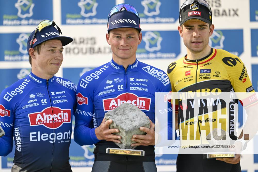 KW14 Roubaix, France - April 9 : Van Aert Wout (BEL) of Jumbo-Visma, Van Der Poel Mathieu (NLD) of Alpecin-Deceuninck and Philipsen Jasper (BEL) of Alpecin-Deceuninck on the podium during the UCI World Tour 120th Paris Roubaix cycling race with start in Compiegne and finish at the Velodrome Andre-Petrieux in Roubaix on April 09, 2023 in Roubaix, France, 09 04 2023 ( Motordriver Kenny Verfaillie - Paris Roubaix 2023 UCI World Tour Cycling Race PhotoNews Panoramic