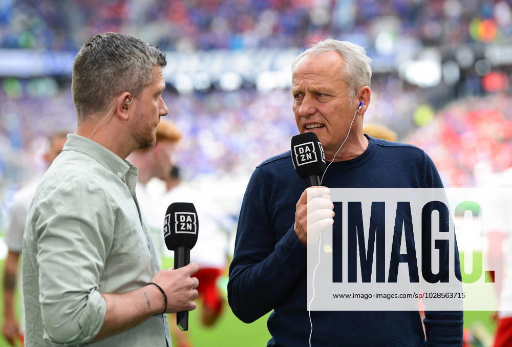 Christian Streich (SC Freiburg, Chef-Trainer) im Gespraech mit Sebastian Kneissl (DAZN-Experte), GER, SC Freiburg vs. FC Schalke 04, Fussball, Bundesliga, Herren, 29. Spieltag, Spielzeit 2022 2023, 23.04.2023, (DFL REGULATIONS PROHIBIT ANY USE OF PHOTOGRAPHS AS IMAGE SEQUENCES AND OR QUASI-VIDEO), GER, SC Freiburg vs. FC Schalke 04, Fussball, Bundesliga, Herren, 29. Spieltag, Spielzeit 2022 2023, 23.04.2023, Freiburg im Breisgau