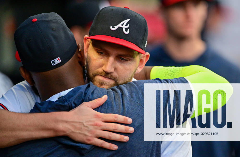 Atlanta Braves starting pitcher Dylan Lee (52) is greeted in the dugout after a pitching change against the Boston Red Sox during the third inning of a Major League Baseball game at Truist Park in Atlanta, Georgia, on Wednesday, May 10, 2023. ATL20230510108 DAVIDxTULIS