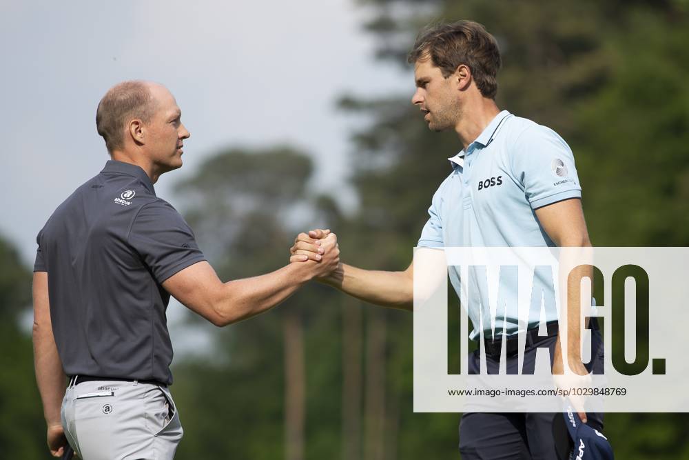 Swedish Simon Forsstrom and Belgian Thomas Detry shake hands after the Soudal Open golf tournament in Schilde, Sunday 14 May 2023. KRISTOFxVANxACCOM x67286648x