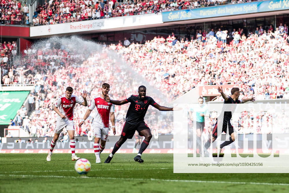 1. Fussball Bundesliga: 1. FC Koeln - FC Bayern Muenchen; 27.05.2023 Ploetzlich gehen im Spiel die Rasensprenger vor der Suedkurve los und sorgen fuer eine Spielunterbrechung 1. Fussball Bundesliga, 1. FC Koeln - FC Bayern Muenchen, Koeln, Rheinenergiestadion am 27.05.2023 DFL REGULATIONS PROHIBIT ANY USE OF PHOTOGRAPHS AS IMAGE SEQUENCES AND OR QUASI-VIDEO.