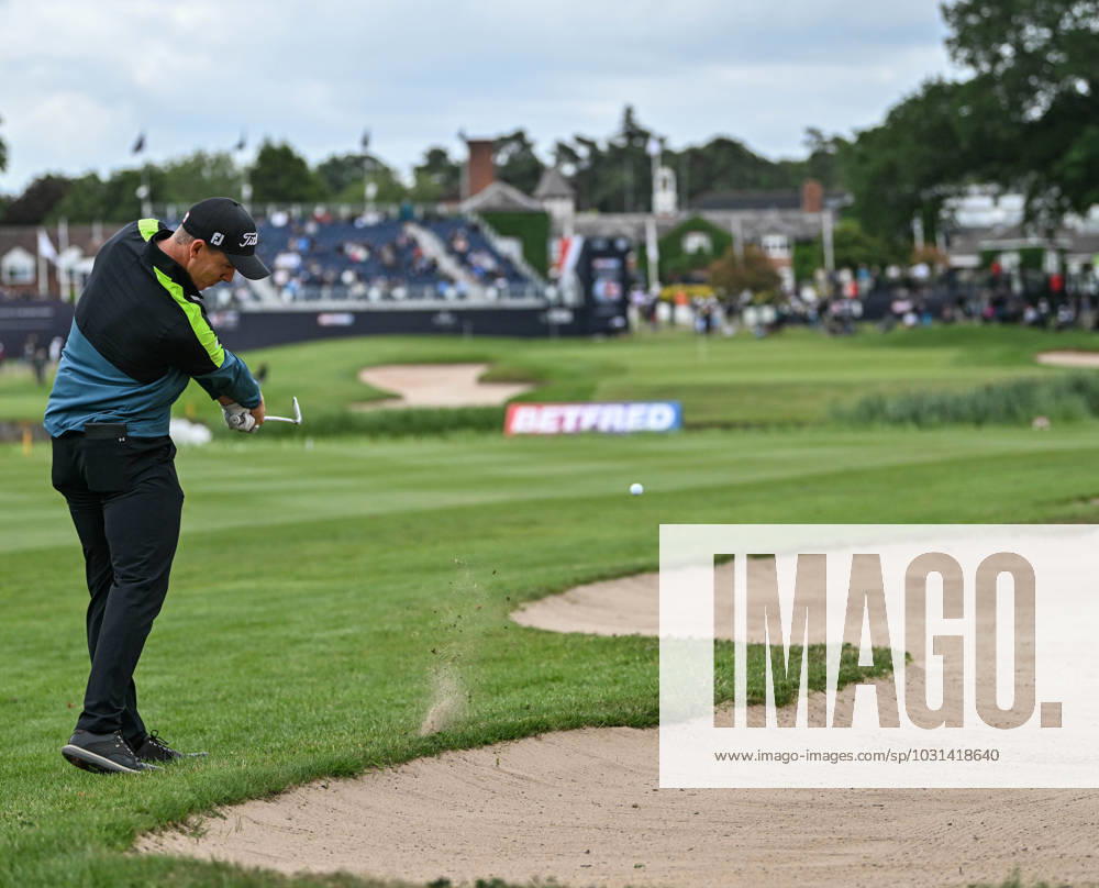 2nd July 2023; The Belfry, Sutton Coldfield, West Midlands, England: Betfred British Masters Golf, Day 4; Grant Forrest hits a long iron to the 18th green from the edge of the bunker ActionPlus12526232 GodfreyxPitt