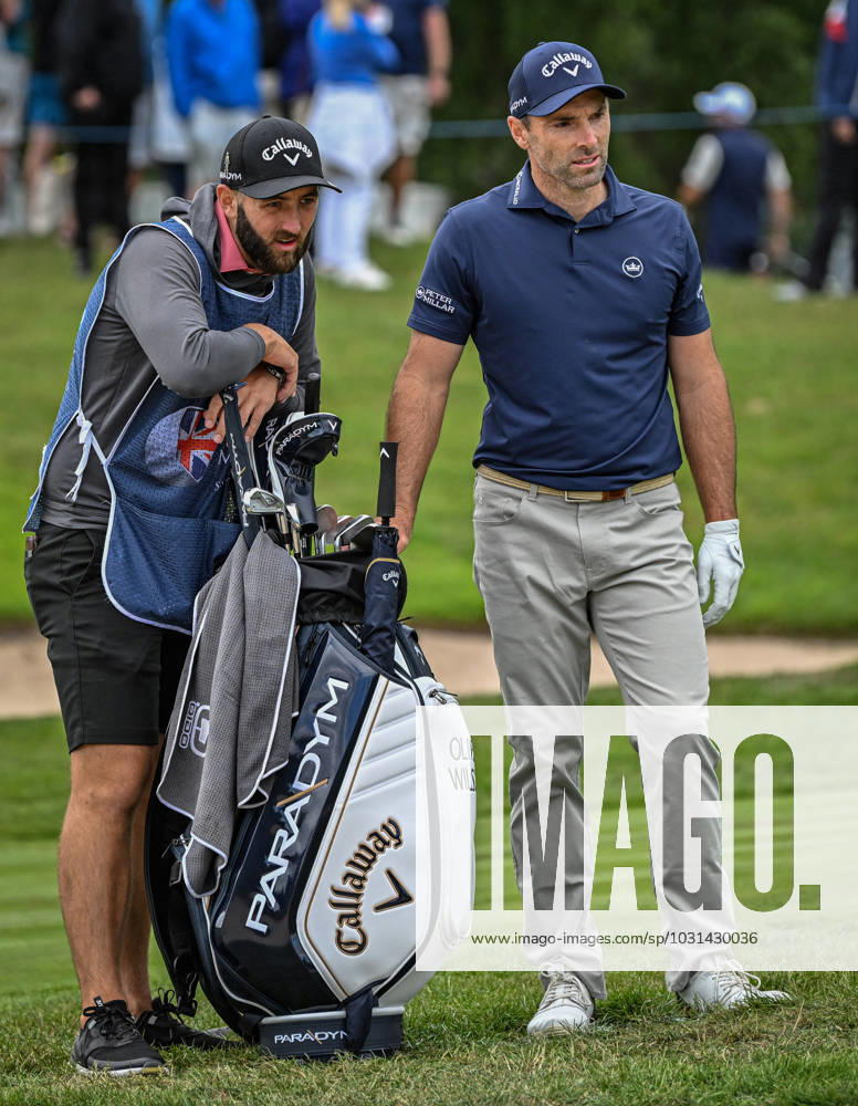 2nd July 2023; The Belfry, Sutton Coldfield, West Midlands, England: Betfred British Masters Golf, Day 4; Oliver Wilson discusses playing out of the bunker on the 17th hole with his caddy ActionPlus12526625 GodfreyxPitt