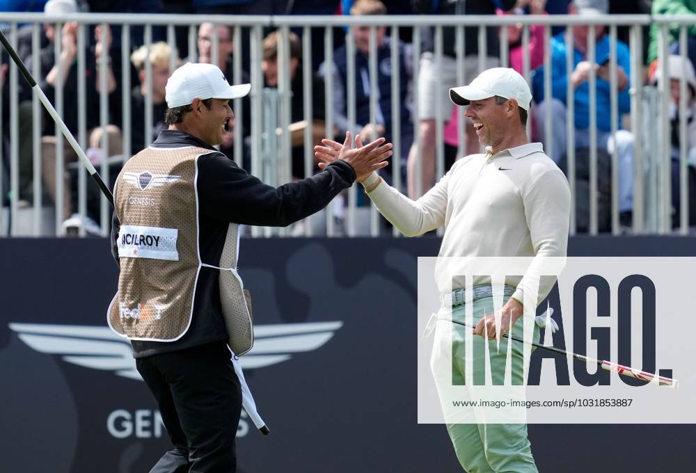 Mandatory Credit: Photo by Stuart Wallace Shutterstock (14003901as) Rory McIlroy (NIR) celebrates with his caddie Harry Diamond after holing a birdie putt on the 18th green to win the Genesis Scottish Open by one shot with a score of 15 under par after 72 holes, beating Robert MacIntyre (SCO) by one shot. Genesis Scottish Open, Day Four, Golf, The Renaissance Club, North Berwick, UK - 16 Jul 2023 Genesis Scottish Open, Day Four, Golf, The Renaissance Club, North Berwick, UK - 16 Jul 2023