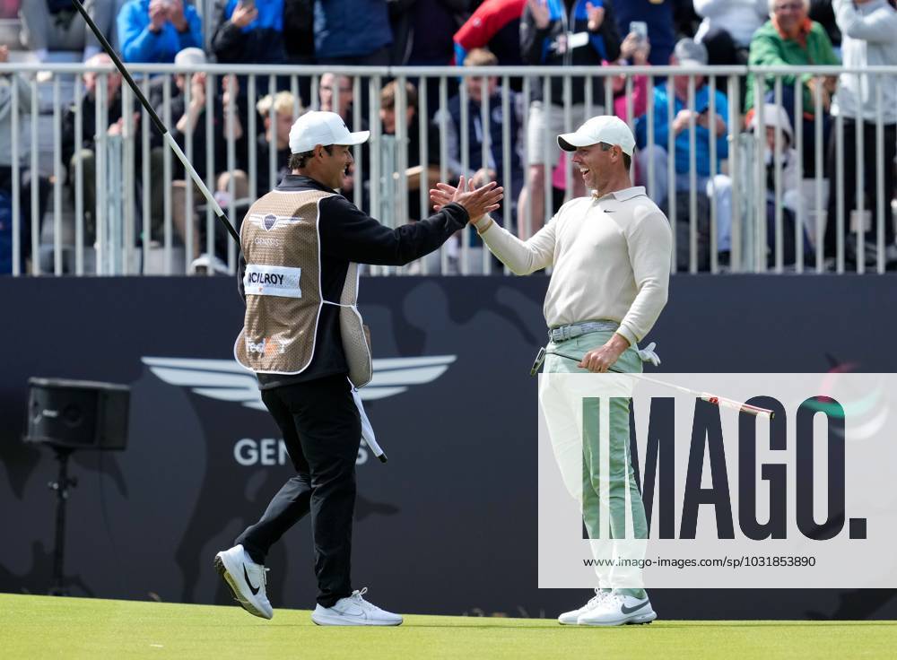 Mandatory Credit: Photo by Stuart Wallace Shutterstock (14003901at) Rory McIlroy (NIR) celebrates with his caddie Harry Diamond after holing a birdie putt on the 18th green to win the Genesis Scottish Open by one shot with a score of 15 under par after 72 holes, beating Robert MacIntyre (SCO) by one shot. Genesis Scottish Open, Day Four, Golf, The Renaissance Club, North Berwick, UK - 16 Jul 2023 Genesis Scottish Open, Day Four, Golf, The Renaissance Club, North Berwick, UK - 16 Jul 2023