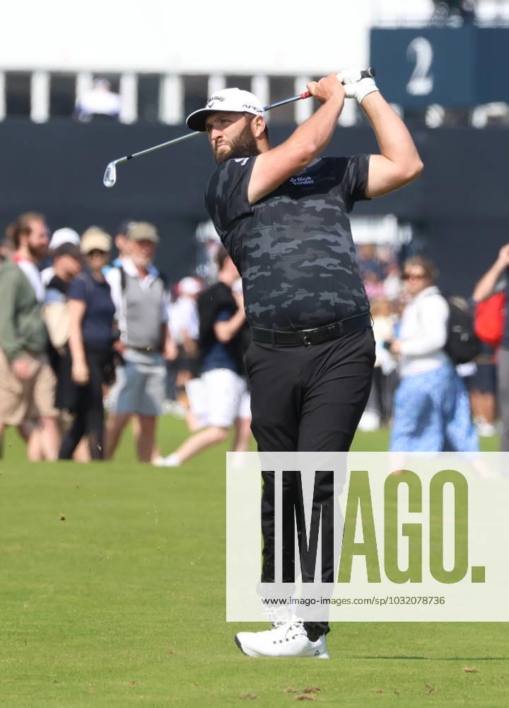 Spain s Jon Rahm hits a fairway iron on the third hole on the first day at the 151st Open Championship at Royal Liverpool Golf Club in Hoylake, England on Thursday, July 20, 2023. LON20230720110 HUGOxPHILPOTT