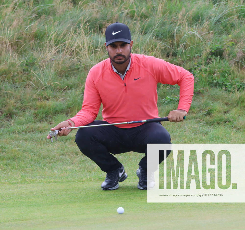 Indian Shubhankar Sharma lines up a putt on the eleventh green on the third day at the 151st Open Championship at Royal Liverpool Golf Club in Hoylake, England on Saturday, July 22, 2023. LON2023072245 HUGOxPHILPOTT