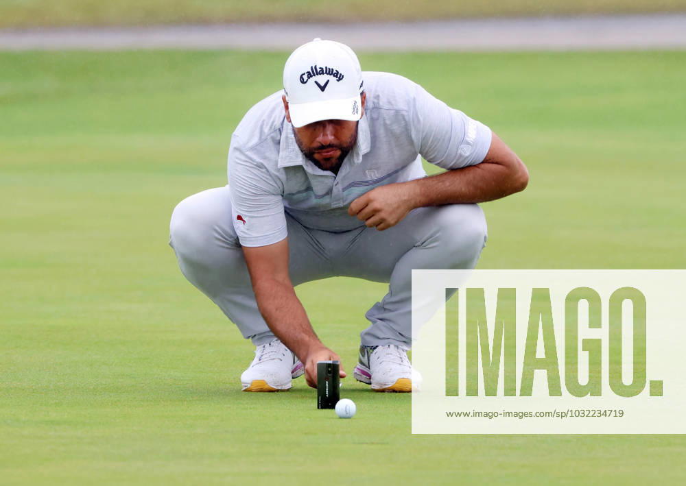 Spain s Adrian Otaegui lines up a putt on the eigth green on the third round at the 151st Open Championship at Royal Liverpool Golf Club in Hoylake, England on Saturday, July 22, 2023. LON2023072265 HUGOxPHILPOTT