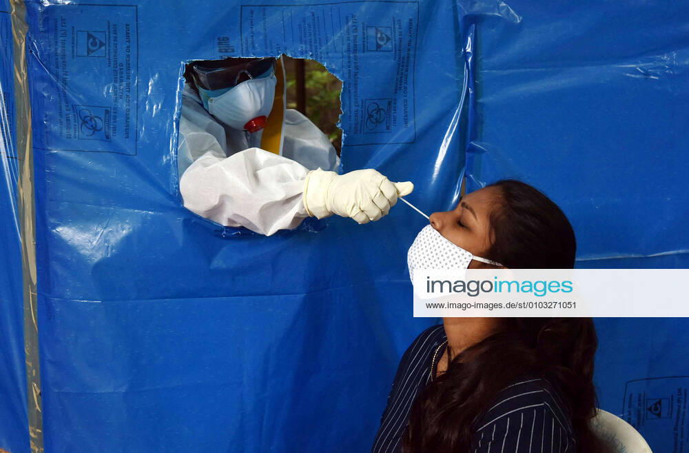 KW34 (200823) -- HYDERABAD, Aug. 23, 2020 -- A health worker collects nasal swab samples for COVID-19 test in Hyderabad, India s southern state Telangana, on Aug. 22, 2020. India s COVID-19 tally surpassed 3 million on Sunday, reaching 3,044,940, according to the latest data released by the federal health ministry. (Str Xinhua) INDIA-TELANGANA-COVID-19-TEST Stringer