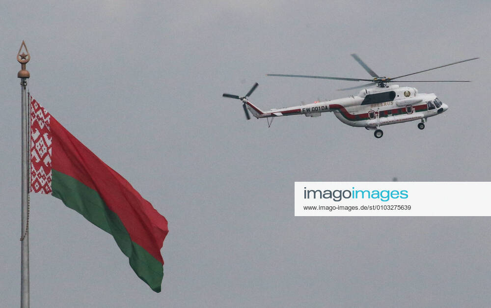 KW34 MINSK, BELARUS - AUGUST 23, 2020: A helicopter carries Belarusian President Alexander Lukashenko to his residence, the Independence Palace, where an opposition rally is held. The political crisis that arose amid the announcement of the 2020 Belarusian presidential election results on August 9, continues in Belarus; mass protests against the election results have been hitting major cities across Belarus resulting in violent clashes with the police. Natalia Fedosenko TASS TS0E465D