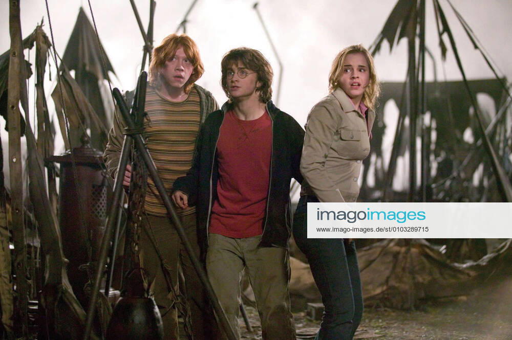 HARRY POTTER AND THE GOBLET OF FIRE RUPERT GRINT as Ron Weasley, DANIEL RADCLIFFE as Harry Potter and EMMA WATSON as Hermione Granger PHOTOGRAPHS TO BE USED SOLELY FOR ADVERTISING, PROMOTION, PUBLICITY OR REVIEWS OF THIS SPECIFIC MOTION PICTURE AND TO REMAIN THE PROPERTY OF THE STUDIO. NOT FOR SALE OR REDISTRIBUTION Date: 2005. Strictly editorial use only in conjunction with the promotion of the film. Credit line mandatory. This image is copyright of the film company and is supplied under the terms of issue as film still. No commercial or book cover use permitted without prior consent from the film company. Mandatory credit line: Image courtesy WARNER BROS & J K ROWLING ?2004 Warner Bros. Entertainment R