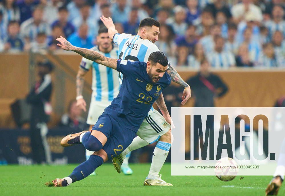 Lionel MESSI, Argentina 10 compete for the ball, tackling, duel, header, zweikampf, action, fight against Theo Hernandez, FRA 22 in the WC Final match ARGENTINA - FRANCE 3-3 (7-5 after penalty shoot out) FIFA World Cup, WM, Weltmeisterschaft, Fussball 2022 QATAR Season 2022 2023, Dec 18, 2022 in Lusail Stadium in Doha, Qatar.