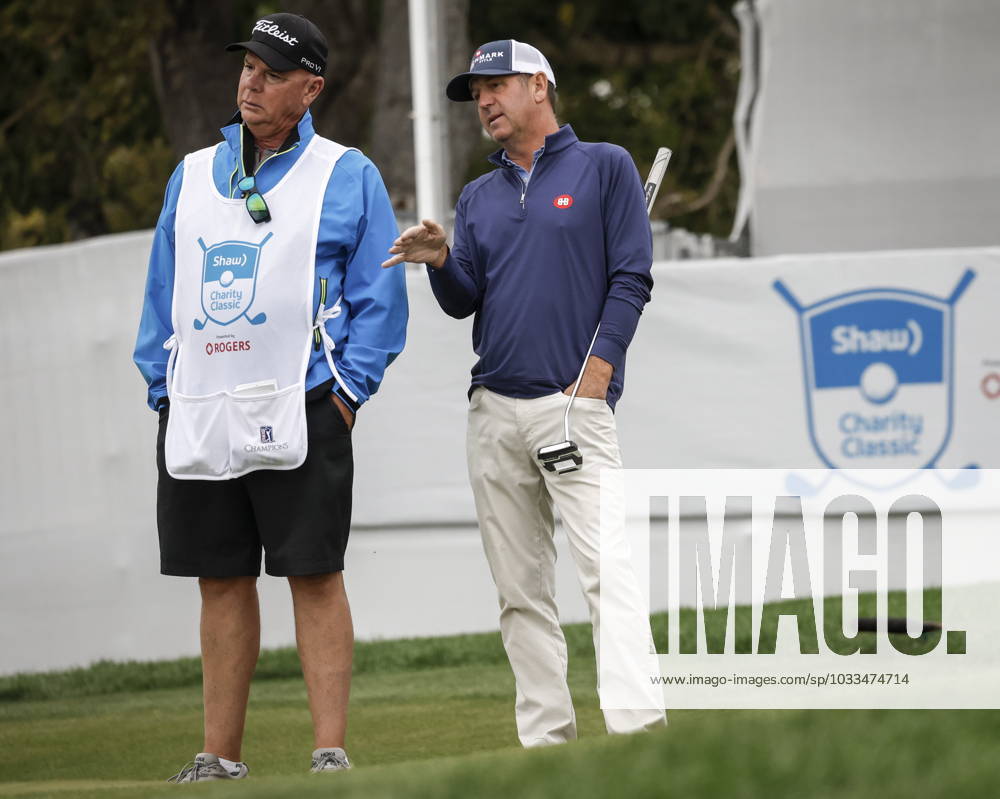 Harrison Frazar, of the United States, talks with his caddie Marcel le Vas on the 16th green during the PGA, Golf Herren Tour Champions Shaw Charity Classic golf event in Calgary, Alta., Friday, Aug. 18, 2023. Harrison Frazar, Marcel le Vas - ZUMAc35_ 20230818_zaf_c35_045