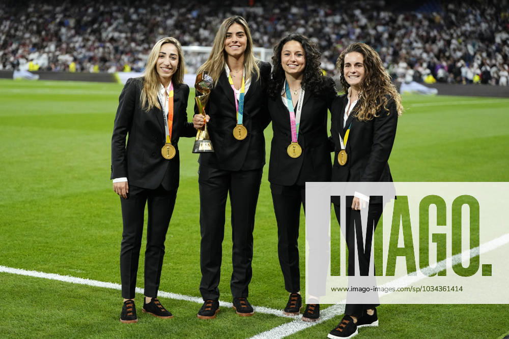 Real Madrid CF v Getafe CF - LaLiga EA Sports Olga Carmona , Misa Rodriguez, Ivana Andres and Teresa Abelleira pose with the World Champions trophy before the LaLiga EA Sports match between Real Madrid CF and Getafe CF at Estadio Santiago Bernabeu on September 2, 2023 in Madrid, Spain. Madrid Spain