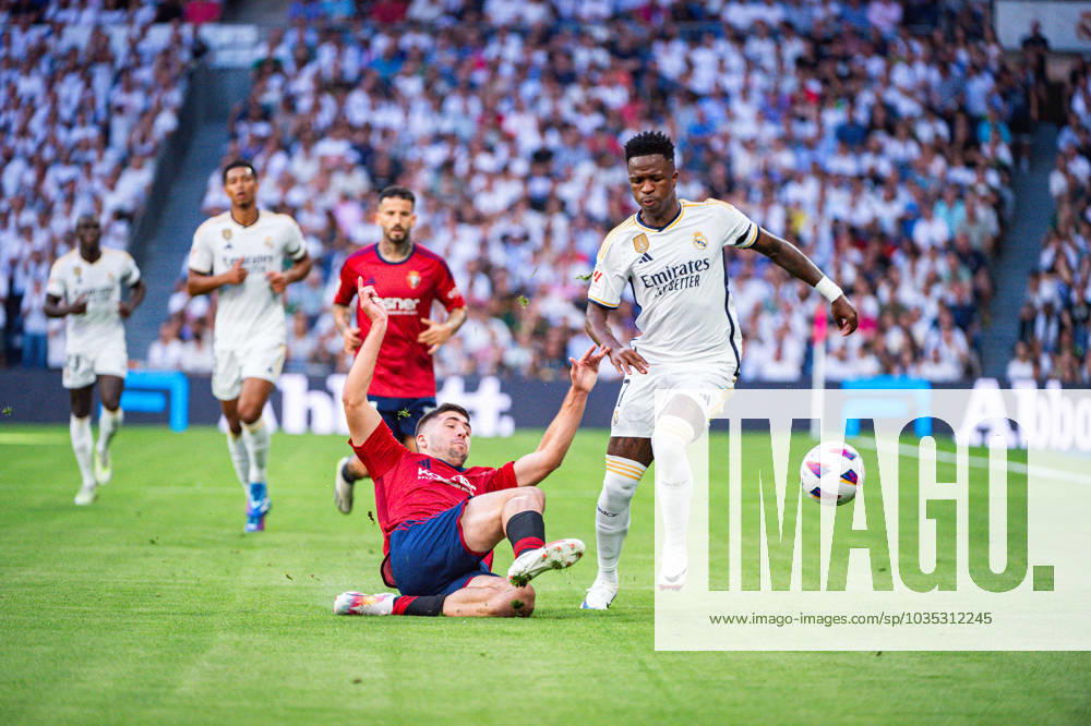 Spanish football La Liga match - Real Madrid vs Osasuna Vinicius Junior (Real Madrid) in action against Jesus Areso (Osasuna) during the football match of Spanish championship La Liga EA Sports between Real Madrid vs Osasuna played at Bernabeu stadium on October 07, 2023 in Madrid, Spain Madrid Spain