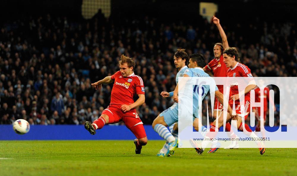 Sergio Aguero of Manchester City scores his second goal.Barclays Premier League match between Manchester City v WBA at the Etihad Stadium, Manchester on the 11th April 2012.. .