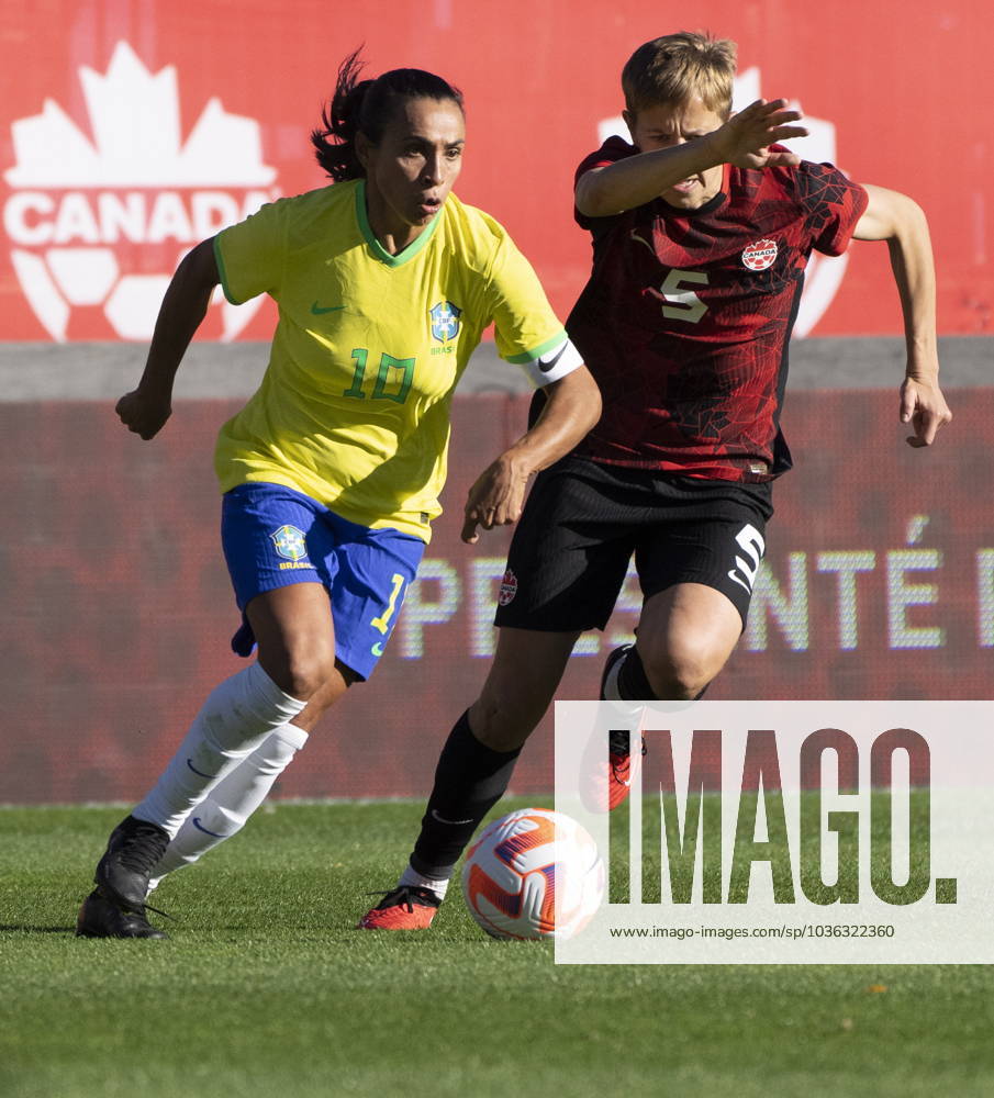 Brazil forward Marta (10) and Canada midfielder Quinn (5) battle for the ball during the first half of a friendly international soccer match, Saturday Oct. 28, 2023 in Montreal. Canada News - October 28, 2023 - ZUMAc35_ 20231028_zaf_c35_057