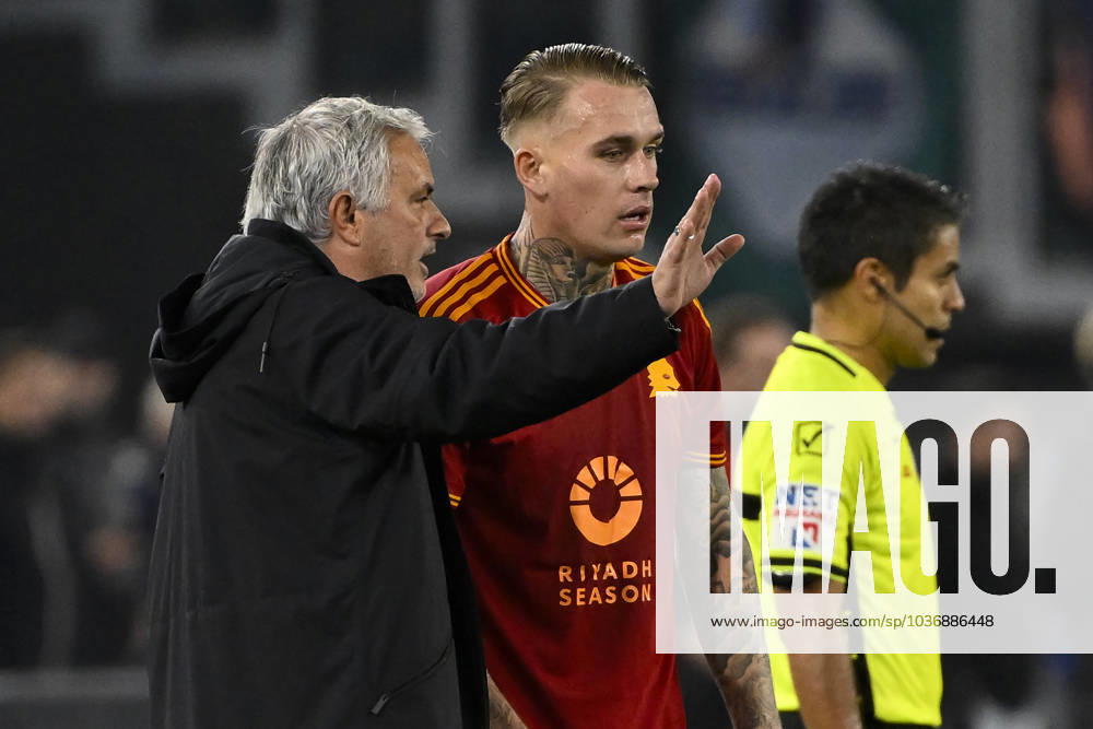 Jose Mourinho coach of AS Roma talks with Rick Karsdorp during the Serie A football match between SS Lazio and AS Roma at Olimpico stadium in Rome (Italy), November 12, 2023. andreaxstaccioli