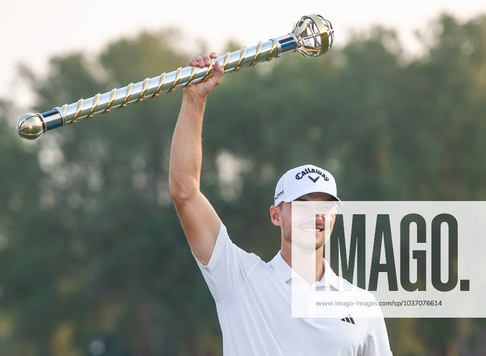 KW46 NICOLAI HoJGAARD of Denmark lifts the trophy after winning DP World Tour Championship in Dubai, United Arab Emirates, Nov 19, 2023. Dubai United Arab Emirates