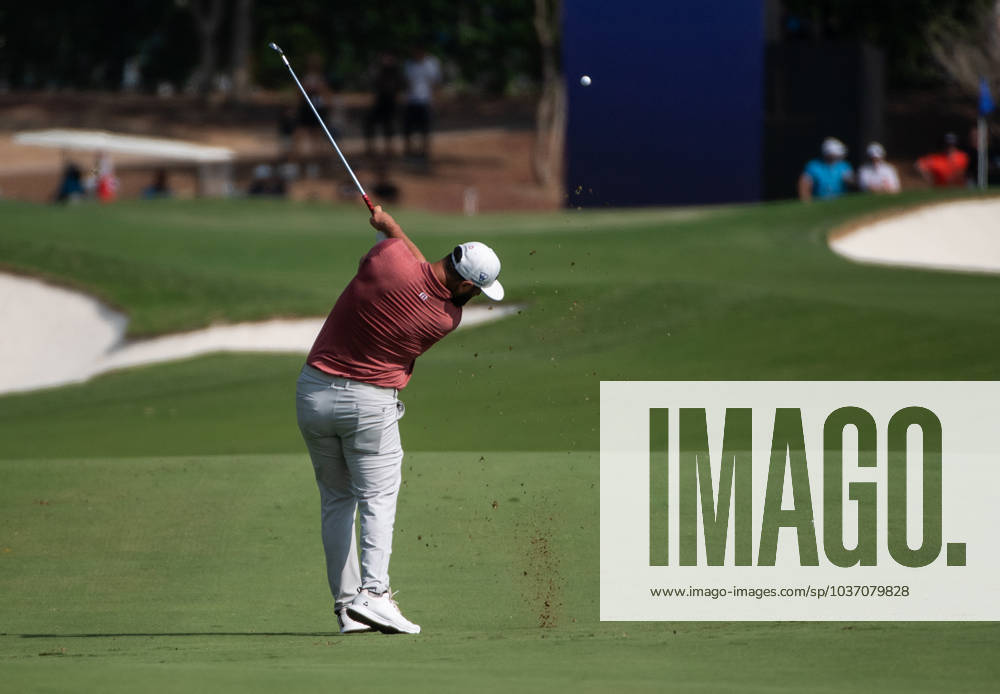 JON RAHM of Spain strikes the ball on the ninth fairway during DP World Tour Championship in Dubai, United Arab Emirates, Nov 19, 2023. Dubai United Arab Emirates