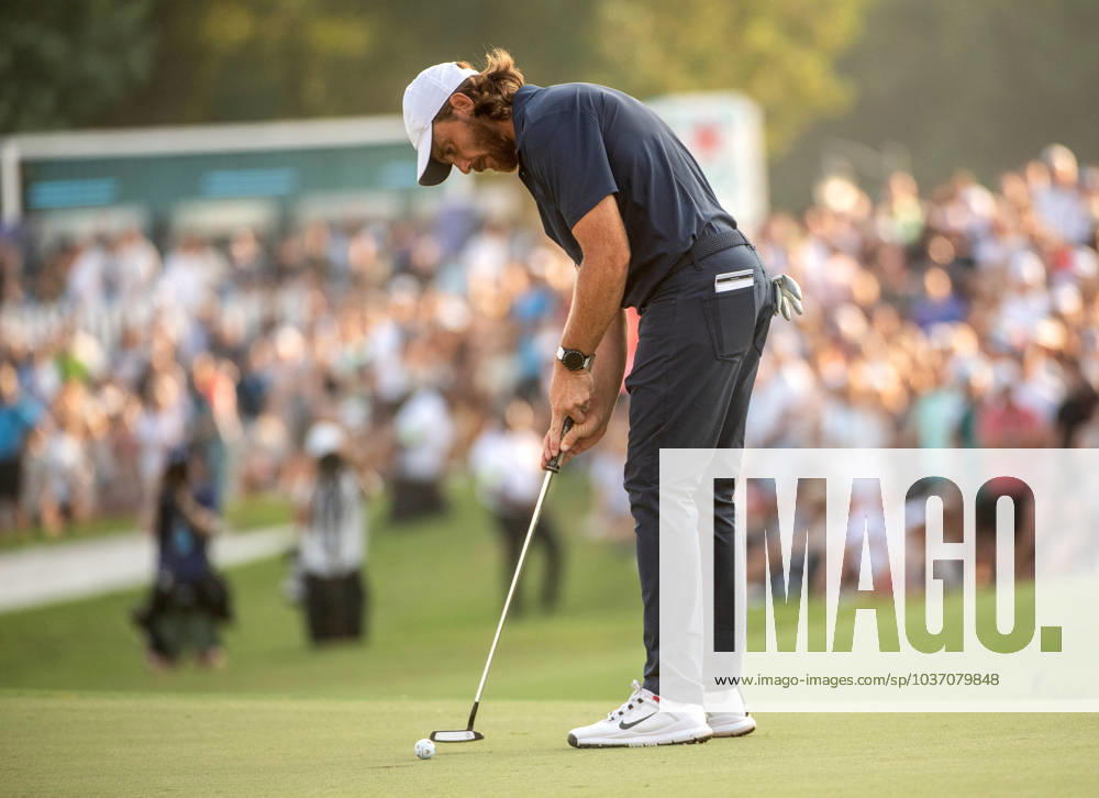 TOMMY FLEETWOOD of England putts on the 18th green during DP World Tour Championship in Dubai, United Arab Emirates, Nov 19, 2023. Dubai United Arab Emirates