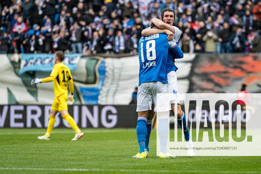 Rostock, Deutschland 17. Februar 2024: 2. BL - 2023 2024 - FC Hansa Rostock vs. Hamburger SV Im Bild: v.li. Juan Jose Perea (Hansa Rostock) jubelt nach seinem Tor zum 1:1 mit Damian Roßbach Rossbach (Hansa Rostock) DFL regulations prohibit any use of photographs as image sequences and or quasi-video.