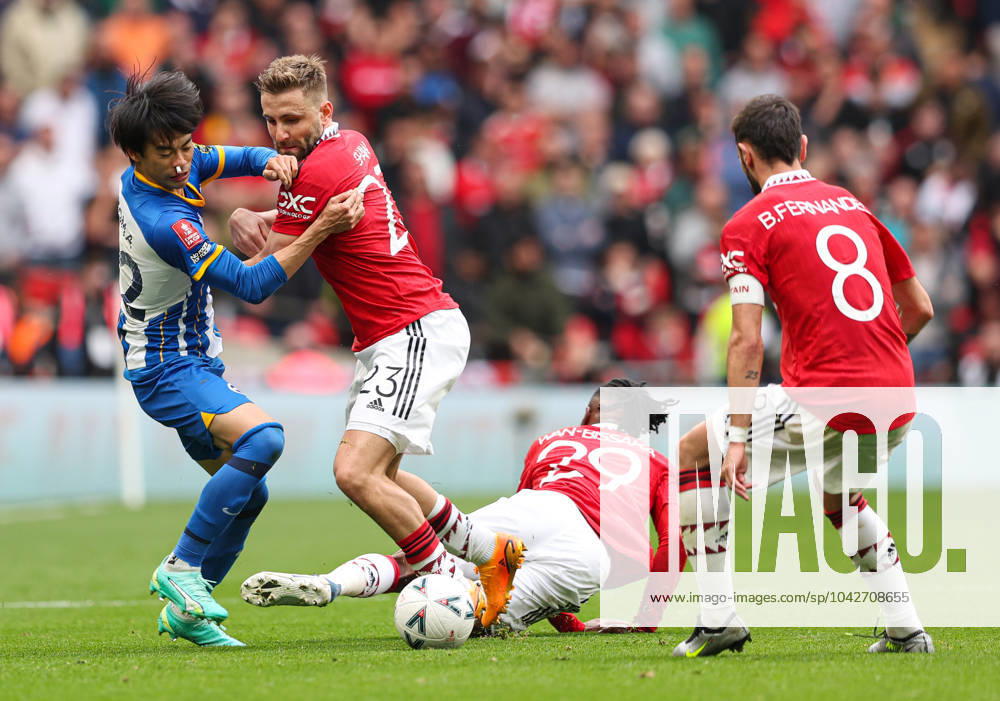 Brighton and Hove Albion v Manchester United, ManU - The FA Cup - Semi-Final - Wembley Stadium April 23, 2023, London: London, England, 23rd April 2023. Karol Mitoma of Brighton and Hove Albion, Luke Shaw of Manchester United, Aaron Wan-Bissaka of Manchester United and Bruno Fernandes of Manchester United (left to right) battle for the ball during the The FA Cup match at Wembley Stadium, London. (Credit Image: Â Kieran Cleeves Sportimage Cal Media) London