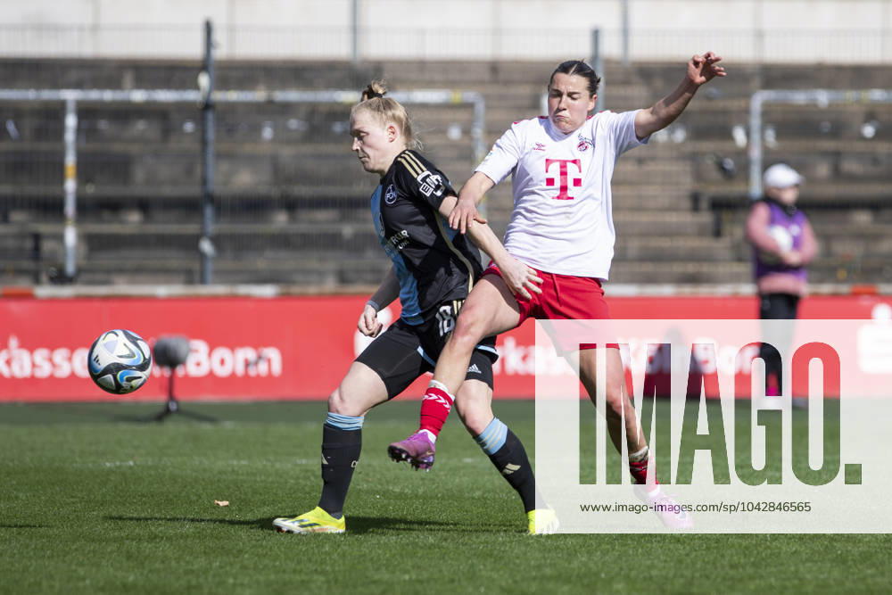 GOOGLE PIXEL Frauen-Bundesliga: 1. FC Köln - 1. FC Nürnberg, 23.03.2024 Franziska Mai (1. FC Nürnberg, 18) im Zweikampf mit Carlotta Wamser (1. FC Köln, 30). GOOGLE PIXEL Frauen-Bundesliga, 1. FC Köln - 1. FC Nürnberg, 17. Spieltag, am 23.03.2024, Franz-Kremer-Stadion, Köln DFL regulations prohibit any use of photographs as image sequences and or quasi-video