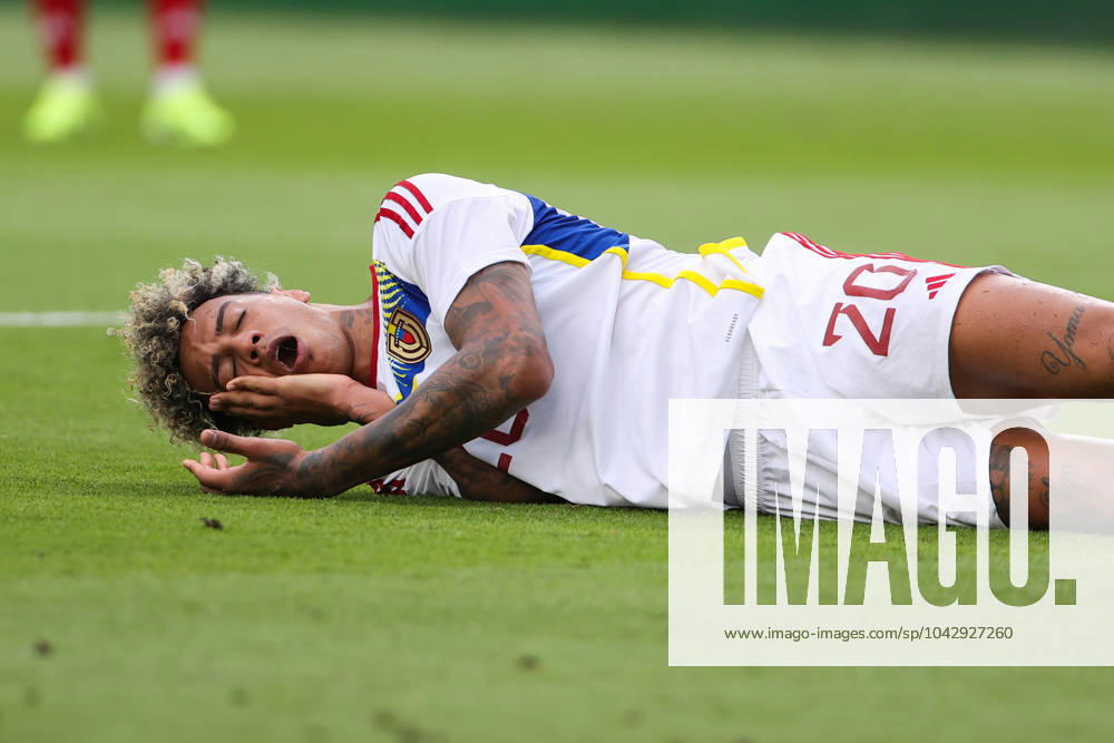 Guatemala v Venezuela - Friendly Match Venezuelan player Jhonder Cadiz, number 20, is holding his jaw after getting injured during a match against Guatemala, during the friendly match against Guatemala at Shell Energy Stadium on March 24, 2024 in Houston, Texas. Houston, Texas Texas United States