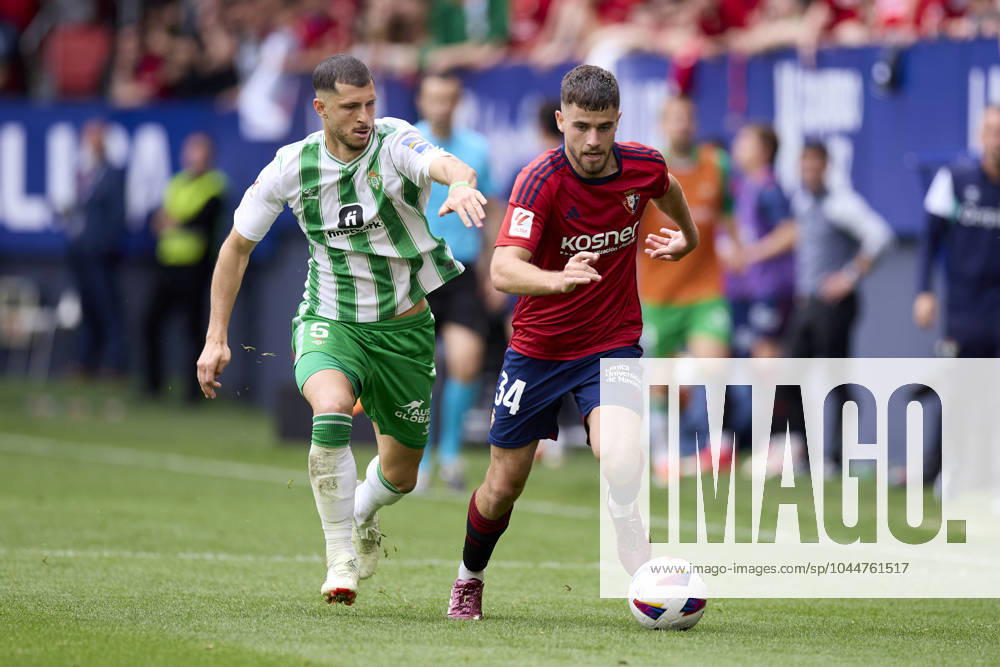 CA Osasuna v Real Betis Balompie - LaLiga EA Sports Guido Rodriguez of Real Betis Balompie competes for the ball with Iker Munoz of CA Osasuna during the LaLiga EA Sports match between CA Osasuna and Real Betis Balompie at El Sadar on May 5, 2024, in Pamplona, Spain. Pamplona El Sadar Navarra Spain RL_OSAvBET_00108