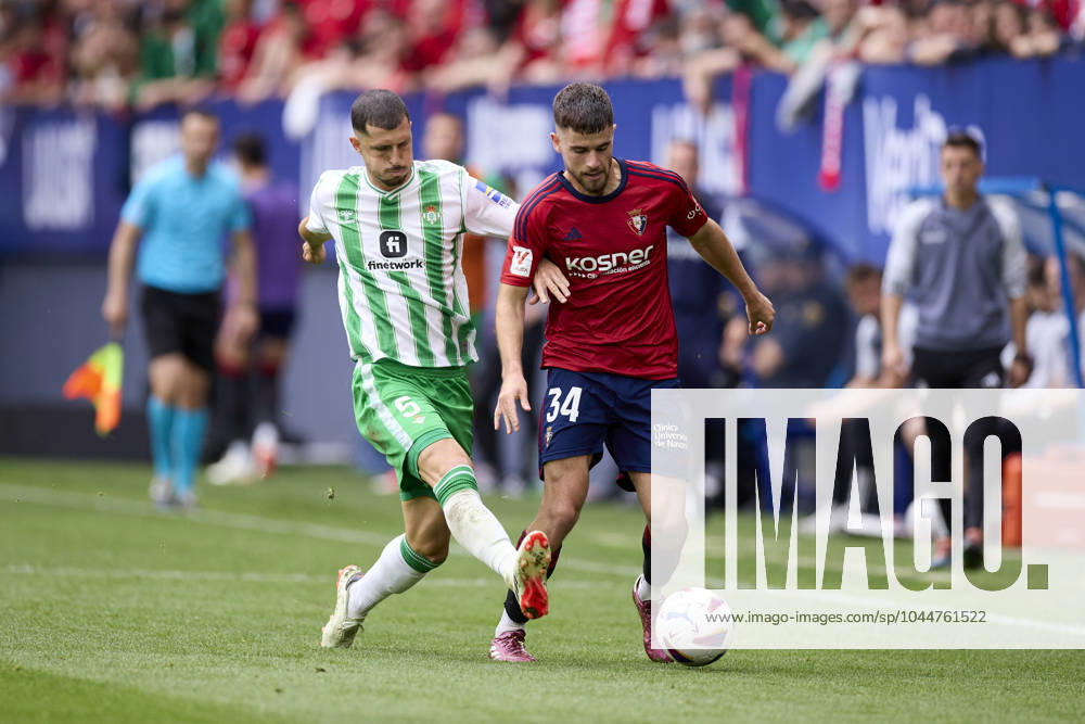 CA Osasuna v Real Betis Balompie - LaLiga EA Sports Guido Rodriguez of Real Betis Balompie competes for the ball with Iker Munoz of CA Osasuna during the LaLiga EA Sports match between CA Osasuna and Real Betis Balompie at El Sadar on May 5, 2024, in Pamplona, Spain. Pamplona El Sadar Navarra Spain RL_OSAvBET_00111