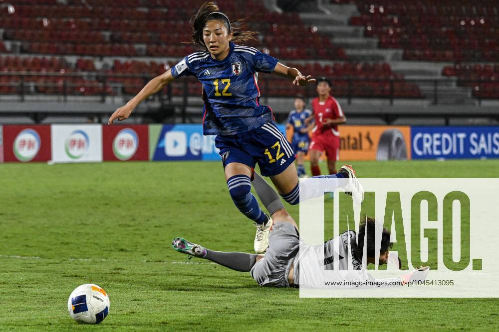 (240519) -- BALI, May 19, 2024 -- Pak Ju-Gyong (bottom), goal keeper of the Democratic People s Republic of Korea (DPRK), blocks Tsuda Anon of Japan during the final between the Democratic People s Republic of Korea (DPRK) and Japan at the AFC U-17 Women s Asia Cup in Bali, Indonesia, May 19, 2024. Agung Kuncahya B.) (SP)INDONESIA-BALI-AFC U17, U 17 WOMEN S ASIAN CUP-2024-FINAL-DPRK VS JPN AgungxKuncahyaxB.xSupriyanto