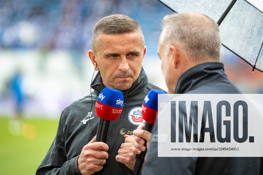 Rostock, Deutschland 19. Mai 2024: 2. BL - 2023 2024 - FC Hansa Rostock vs. SC Paderborn Im Bild: v.li. Trainer Mersad Selimbegovic (Hansa Rostock) im Interview bei SKY DFL regulations prohibit any use of photographs as image sequences and or quasi-video.