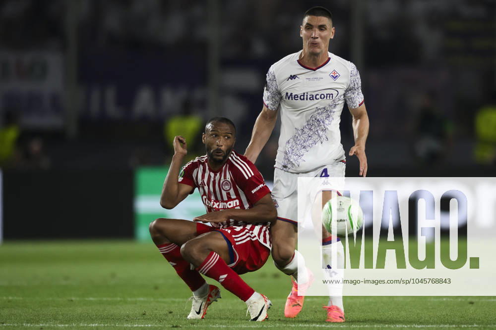 Olympiacos FC v ACF Fiorentina - UEFA Conference League Ayoub El Kaabi of Olympiacos FC competes for the ball with Nikola Milenkovic of ACF Fiorentina during the UEFA Conference League final football match between Olympiacos FC and ACF Fiorentina. Athens Greece
